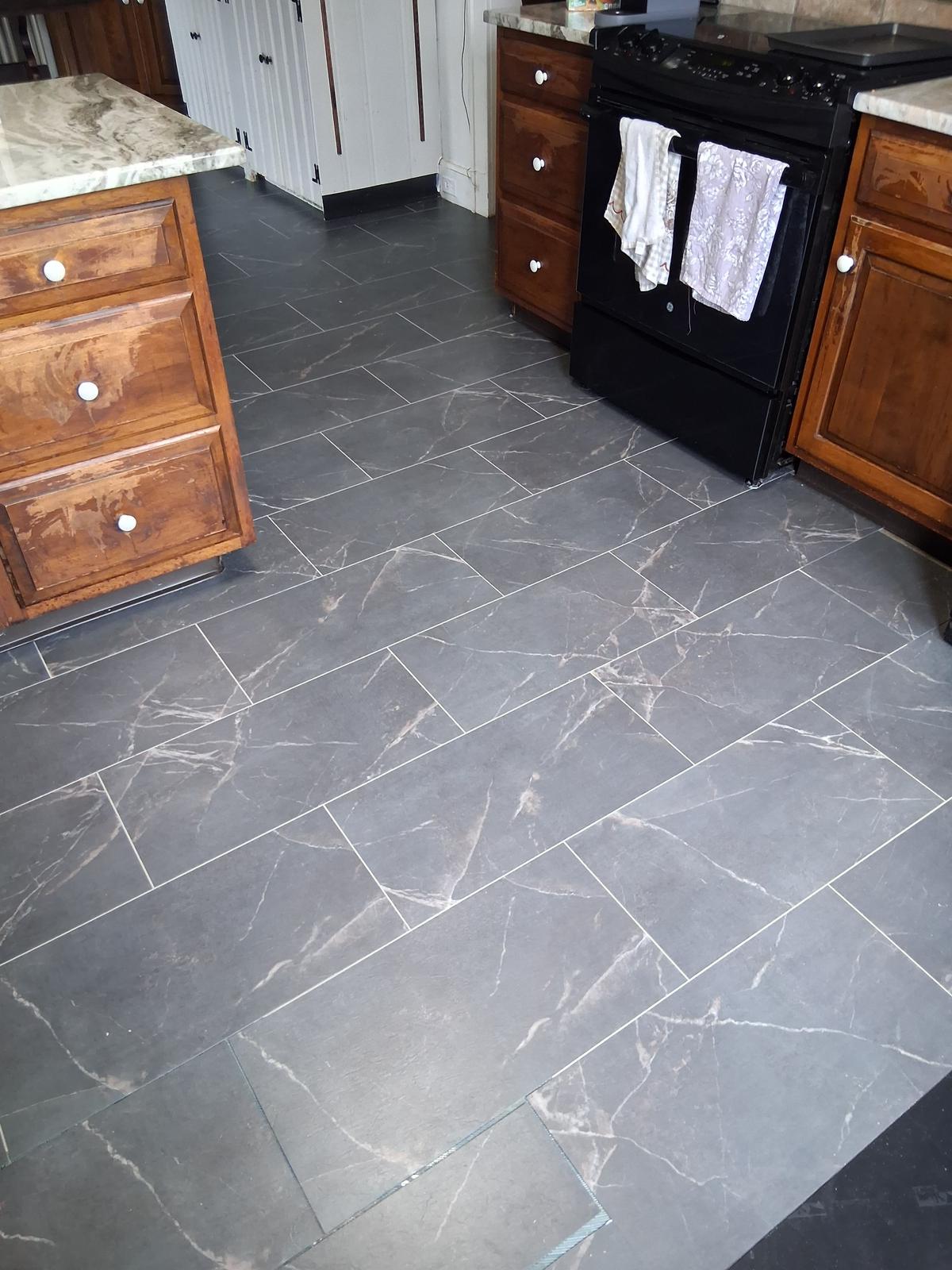 Modern kitchen with vinyl plank flooring